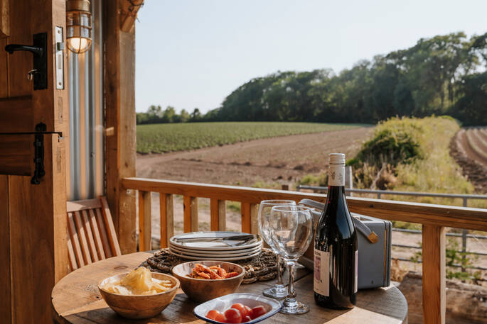 Dining table and seating for two in the deck area