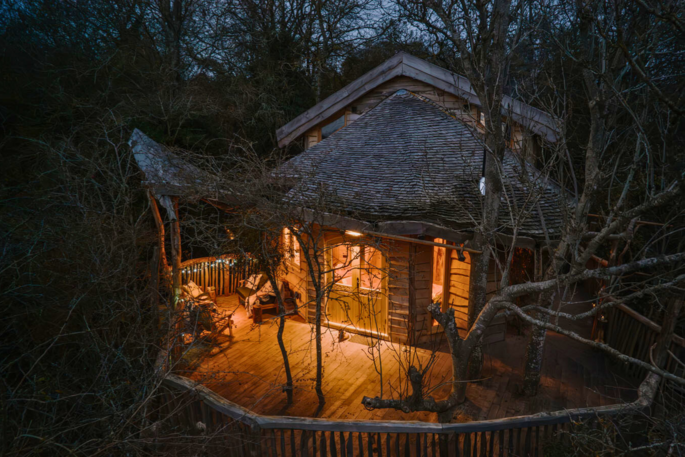 Treehouse front exterior drone shot