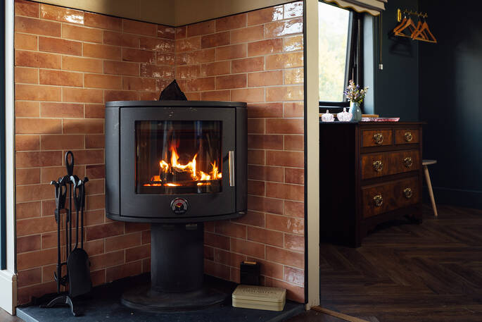 Main source of heat comes from the wood burner
