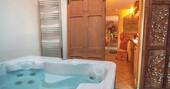Hot tub room next to kitchen