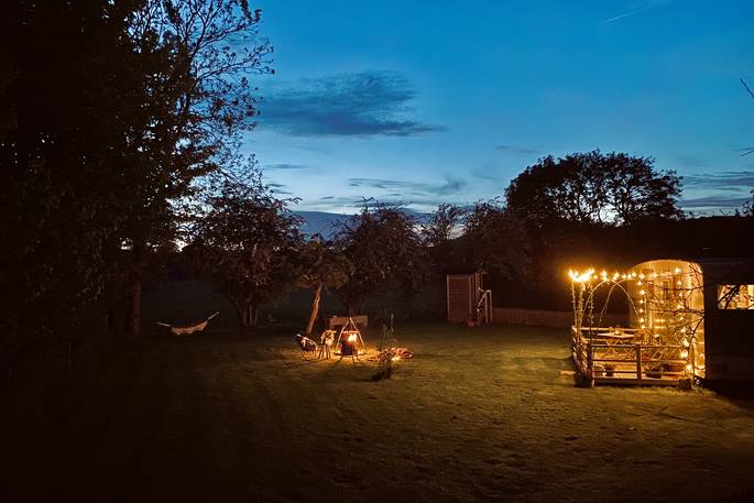 The Sipson wagon glamping during the night, Vowchurch, Herefordshire