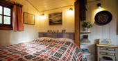 Millie the Hut shepherd's hut double bed, Wegnalls Mill, Presteigne, Herefordshire - Owen Howells Photography