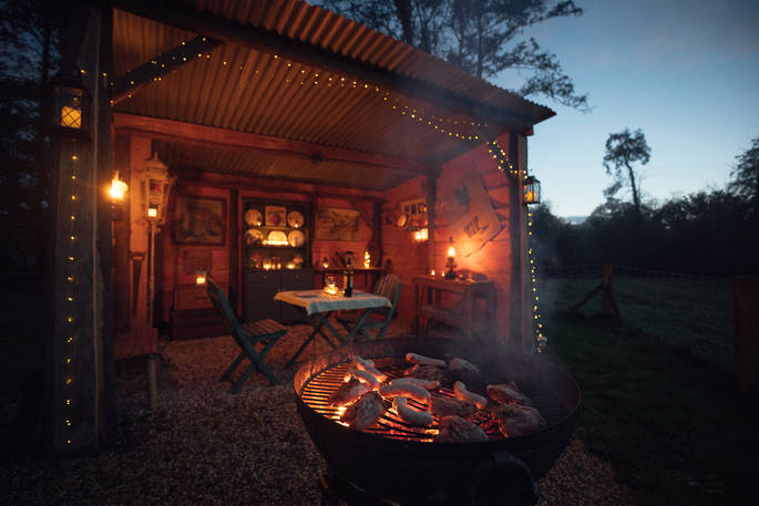 Millie the Hut shepherd's hut fairy lights during the night, Wegnalls Mill, Presteigne, Herefordshire - Owen Howells Photography