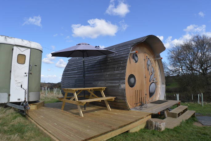 Hedgehog Hall cabin decking with picnic table, Landews Meadow Farm, Challock, Kent