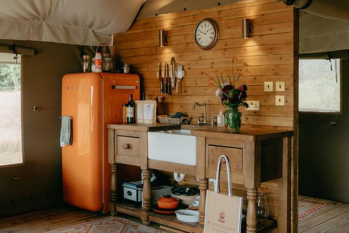 Kitchen equipped with a fridge freezer, gas hob, kettle, toaster
