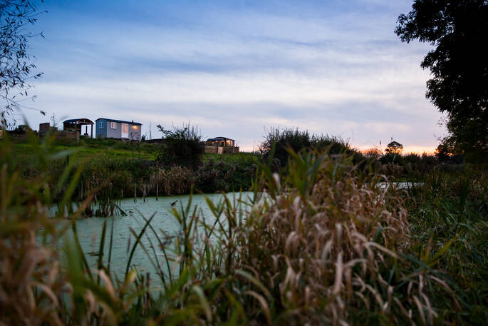 Tin and Wood huts by the canal