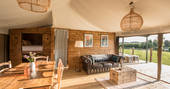 Open plan kitchen and living area space inside your safari tent at The Nest in Lincolnshire
