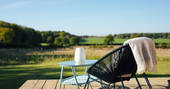 Sit down and enjoy the view at the Woodcock Cabin at Bagthorpe Farm in Norfolk