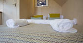 Comfortable double bed inside the Alnmouth Huts in Northumberland 
