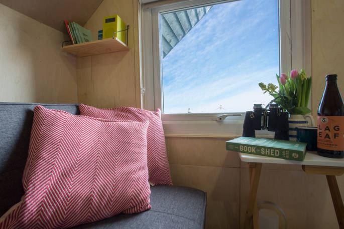 Sit inside the hut, read a book and look at the sea views in Alnmouth 