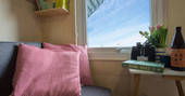 Sit inside the hut, read a book and look at the sea views in Alnmouth