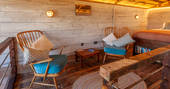 Lottie's Cabin - mezzanine armchairs reading spot, Hillside Huts & Cabins, Morpeth, Northumberland