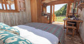 King-size bed inside Cheviot at Huts in the Hills in Northumberland