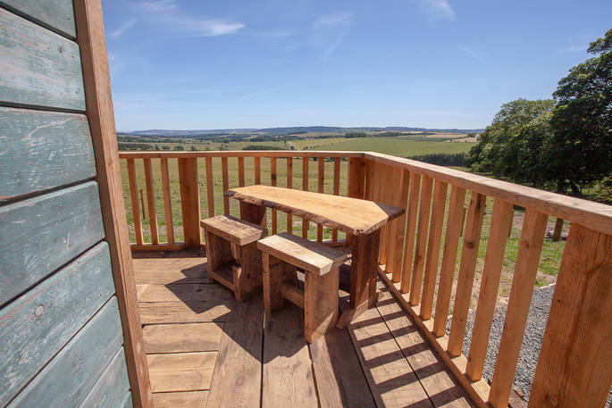Sit on the balcony of Hedgehope, in the bright blue sky of Northumberland