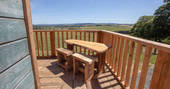 Sit on the balcony of Hedgehope, in the bright blue sky of Northumberland