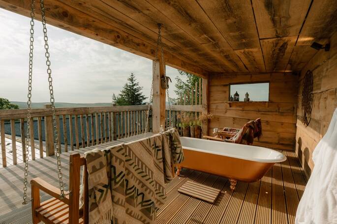 Terrace with outdoor bath tub