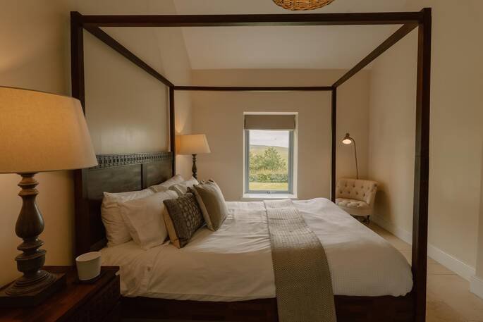 Master bedroom with a king-size bed