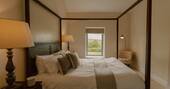 Master bedroom with a king-size bed