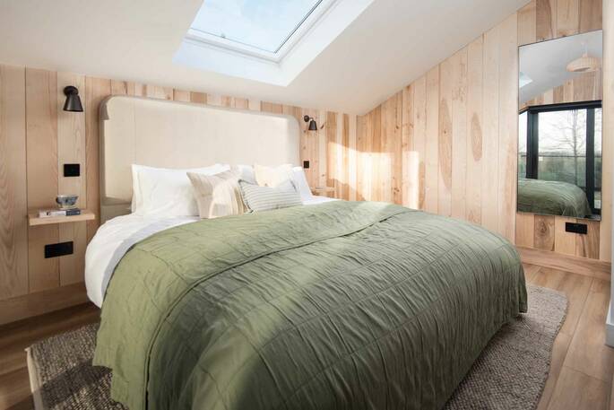 Master bedroom with a king size bed