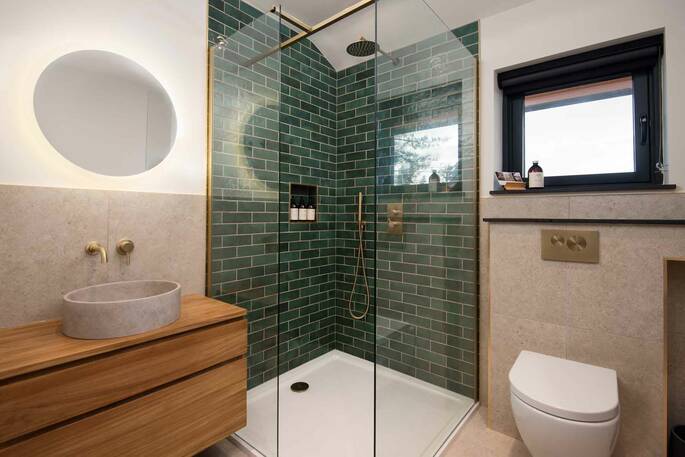 Rainfall shower, flushing toilet and sink