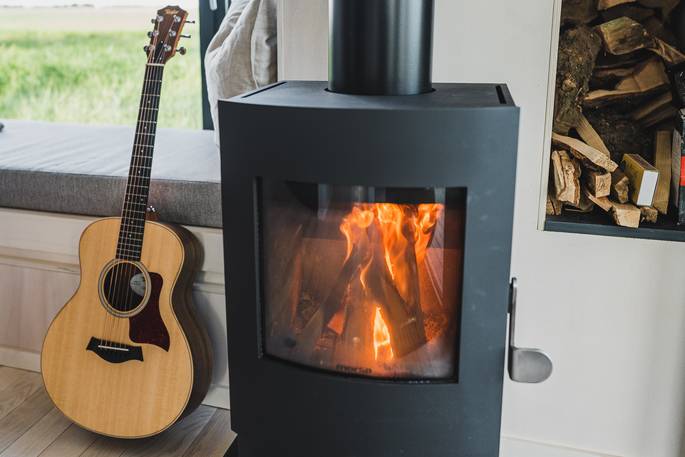 Ash at Tughall cabin wood burner, Tughall Grange Farm, Chathill, Northumberland