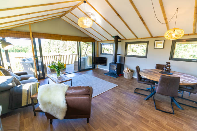 Living room area inside the safari lodge at at Bird Holme Glamping in Nottinghamshire