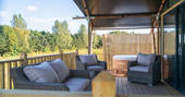 Outdoor seating on the decking of your safari tent at Bird Holme Glamping in Nottinghamshire