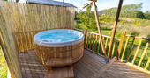 Soak in the hot tub and enjoy the views at Bird Holme Glamping in Nottinghamshire