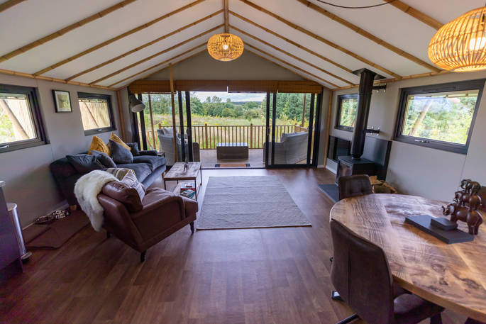 Open plan living area inside your safari lodge at Bird Holme Glamping in Nottinghamshire