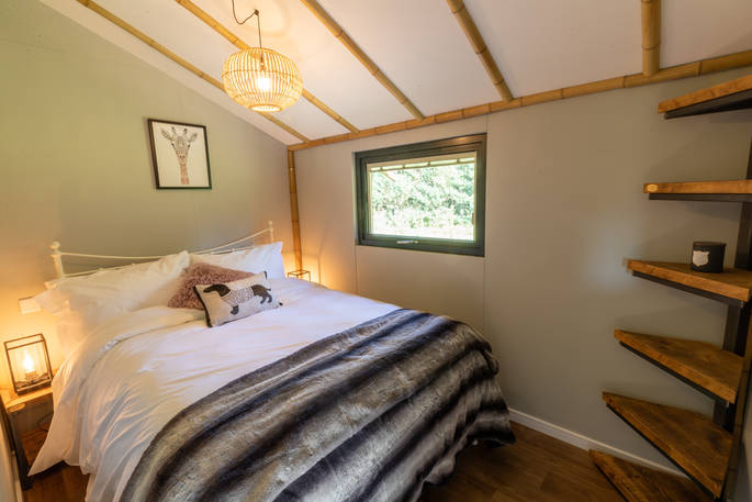 One double bed inside your safari lodge at Bird Holme Glamping in Nottinghamshire