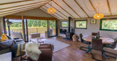 Open plan living area inside your safari lodge at Bird Holme Glamping in Nottinghamshire