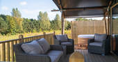 Outdoor seating on the decking of your safari tent at Bird Holme Glamping in Nottinghamshire