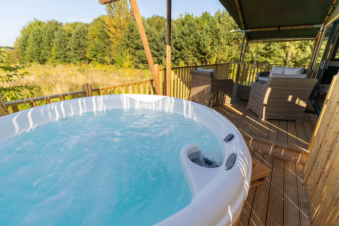 Soak in the hot tub and enjoy the views at Bird Holme Glamping in Nottinghamshire