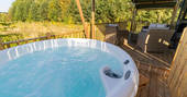 Soak in the hot tub and enjoy the views at Bird Holme Glamping in Nottinghamshire