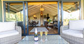 Crack open a bottle of champagne on your decking at Osprey cabin in Nottinghamshire