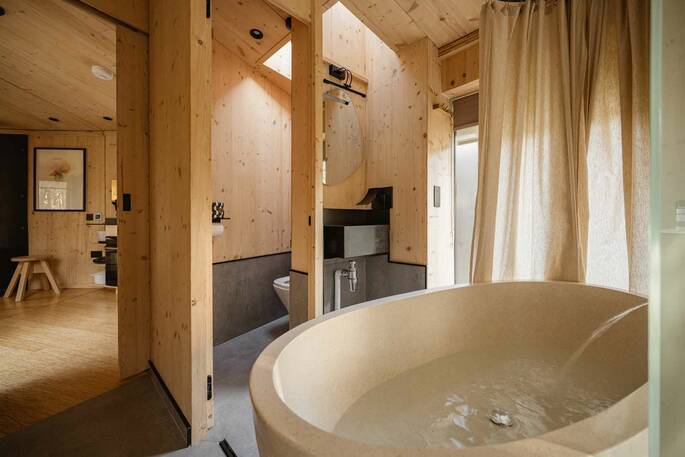 WC with a flushing toilet and sink