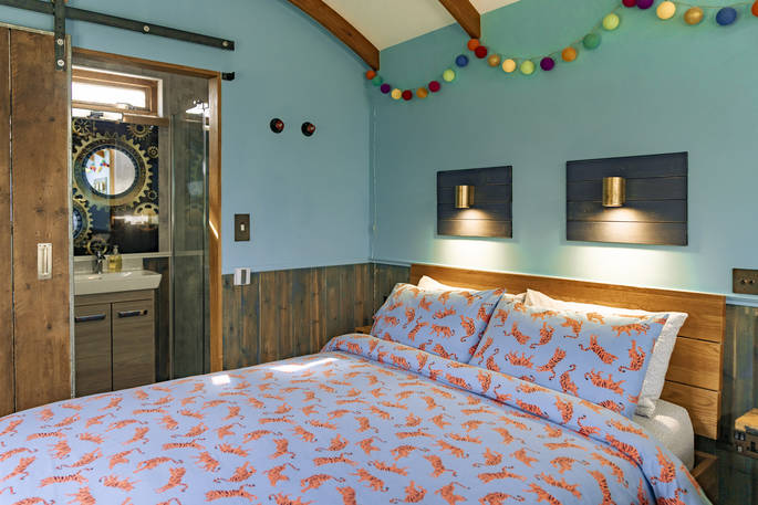 Aether's Tilt cabin bedroom at Offa's Pitch, Craven Arms, Shropshire