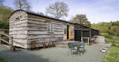 Aether's Tilt cabin outdoor area at Offa's Pitch, Craven Arms, Shropshire