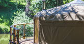A side view of After the Gold Rush Yurt overlooking the river in Shropshire