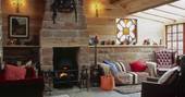 Fireplace and living room interior at The Dipping Shed, Shropshire 