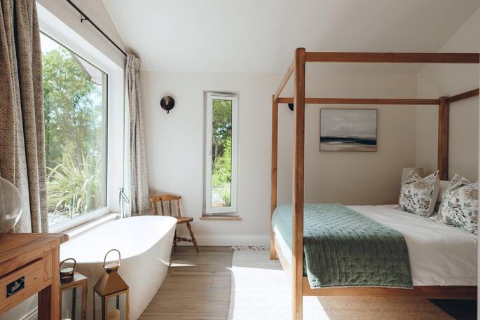 Bedroom with a bath tub