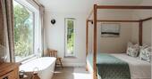 Bedroom with a bath tub