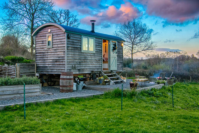 Exterior of Dimpsey Hither Shepherd's Hut at dusk 