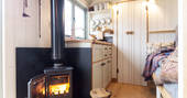 Cosy up by the wood-burner inside Dimpsey shepherd's hut in Somerset 