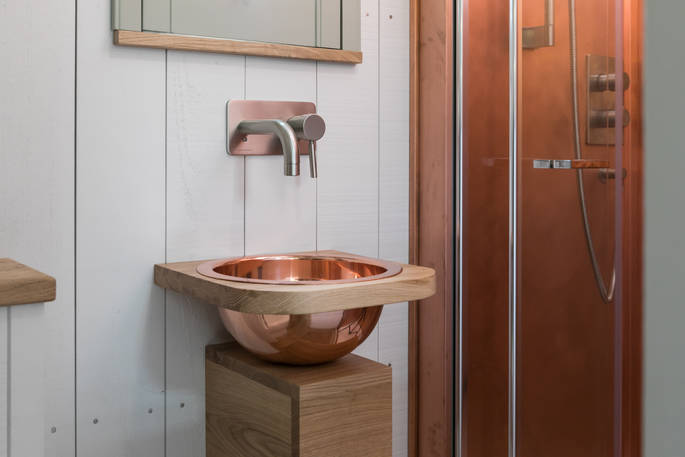 A stylish copper basin in the bathroom at Dimpsey Yonder in Somerset