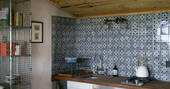The Gardener's Shed cabin kitchen area at Mello View, Winsham, Somerset