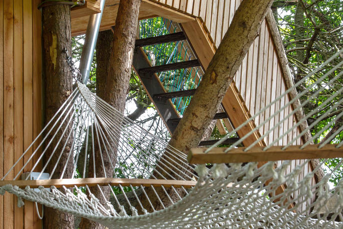 Relax in the hammock and watch the trees sway at Orchard Rooms Treehouse in Somerset