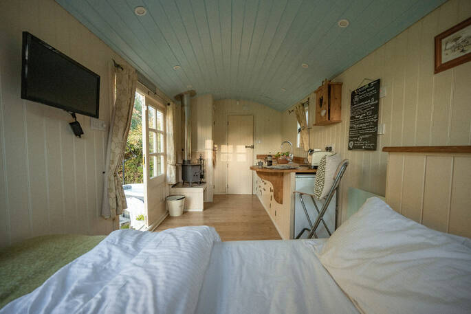 View from the bed of inside the hut