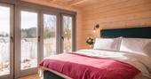 Discovery Lodge cabin bedroom with view, Blyth Rise Stays, Laxfield, Suffolk