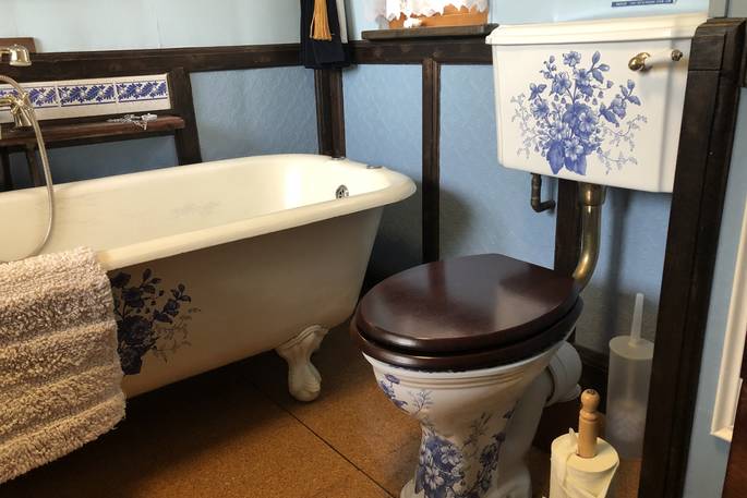 Bathroom inside The Victorian Railway Carriage at Coppins Farm in Suffolk  